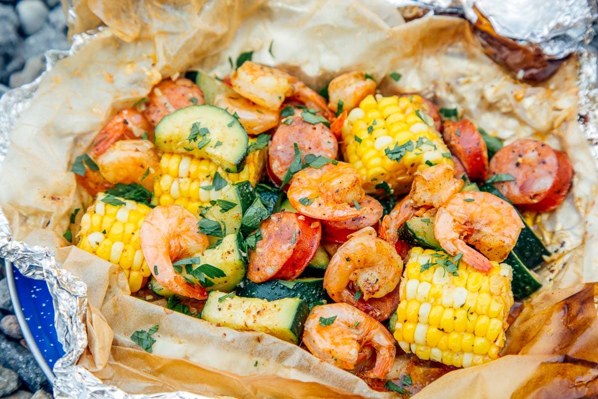 https://campfirefoodie.com/wp-content/uploads/2021/01/Shrimp-Boil-Foil-Packet-Campfire-Meal.jpg