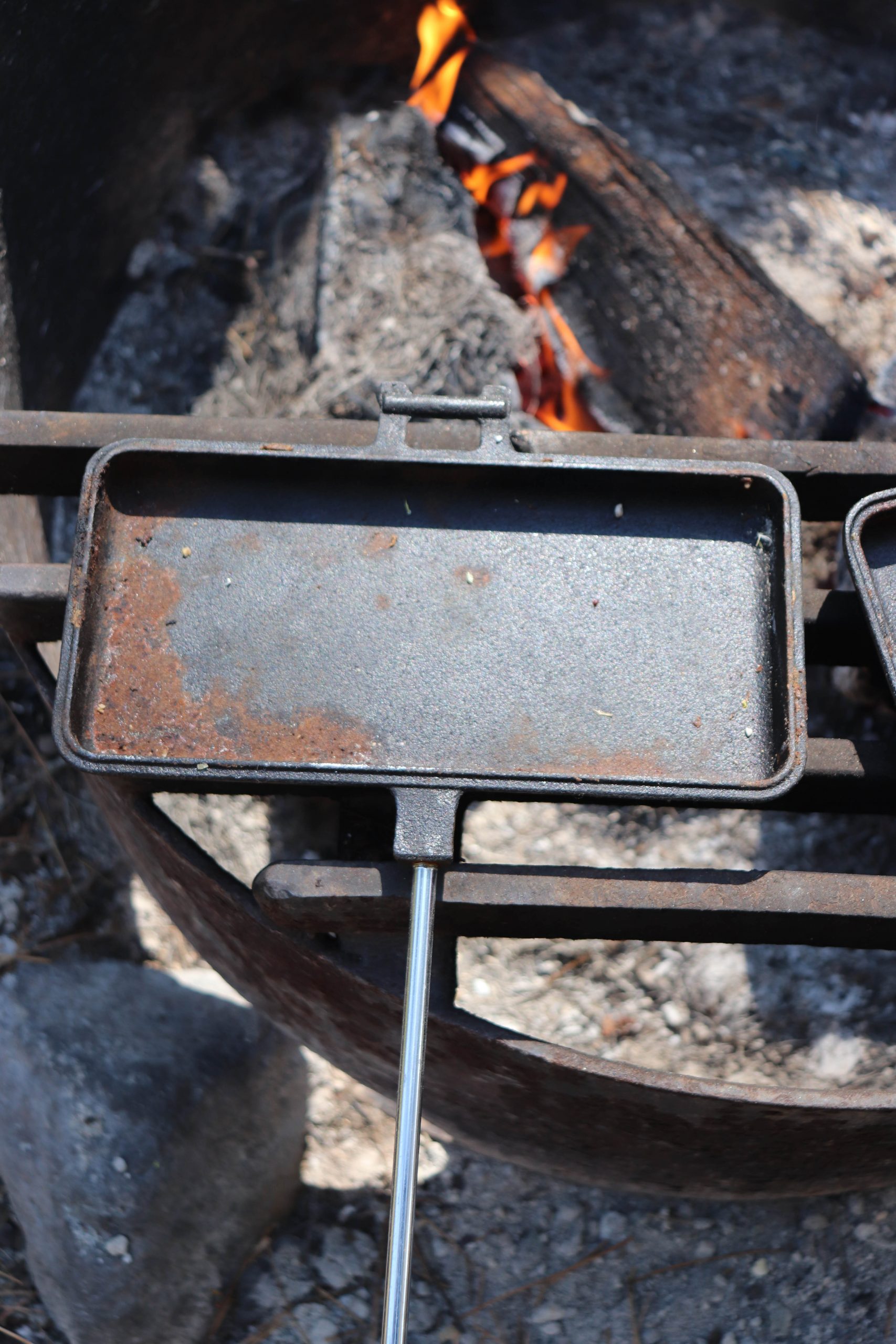 Campfire pie irons hit different. : r/castiron