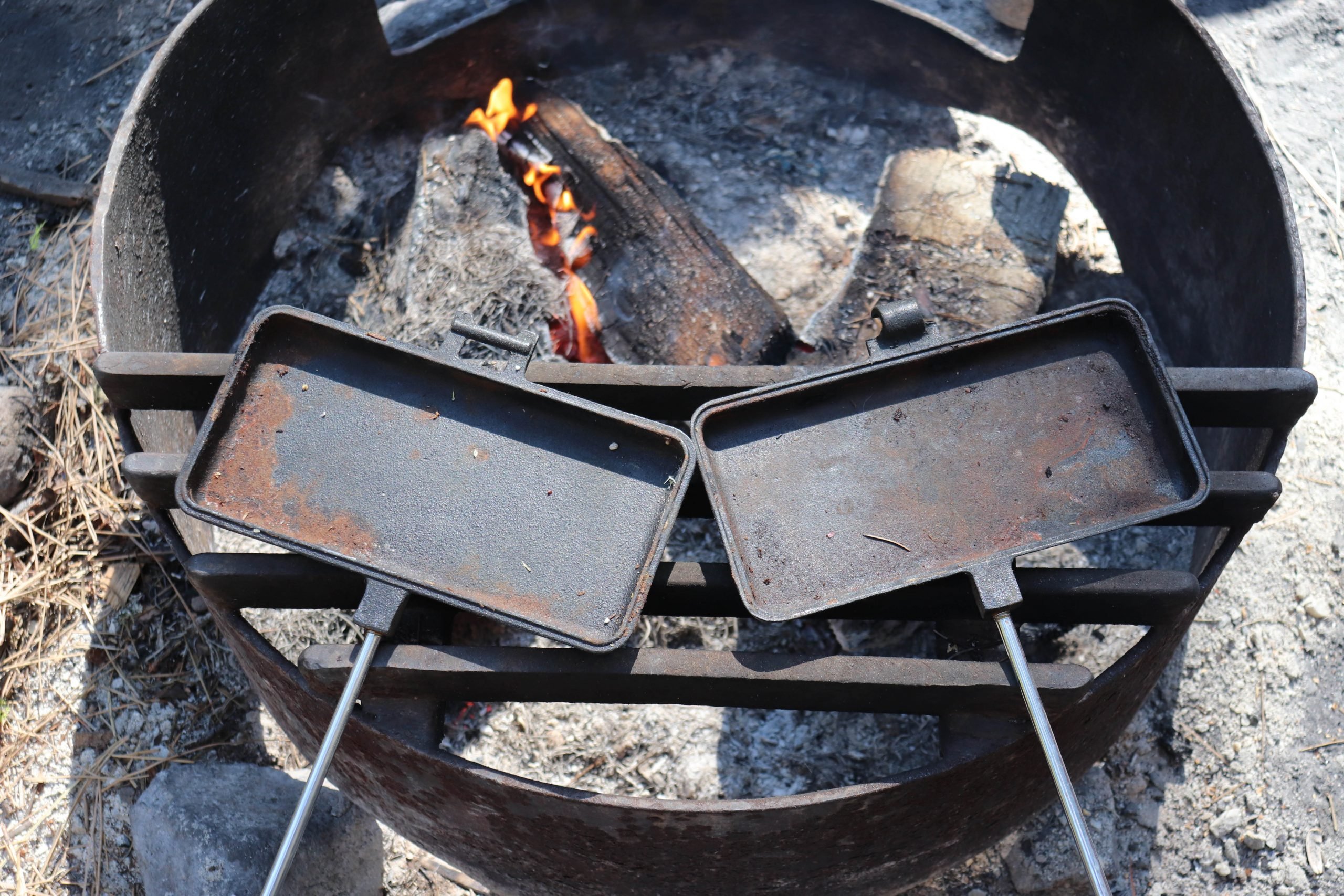 Campfire pie irons hit different. : r/castiron