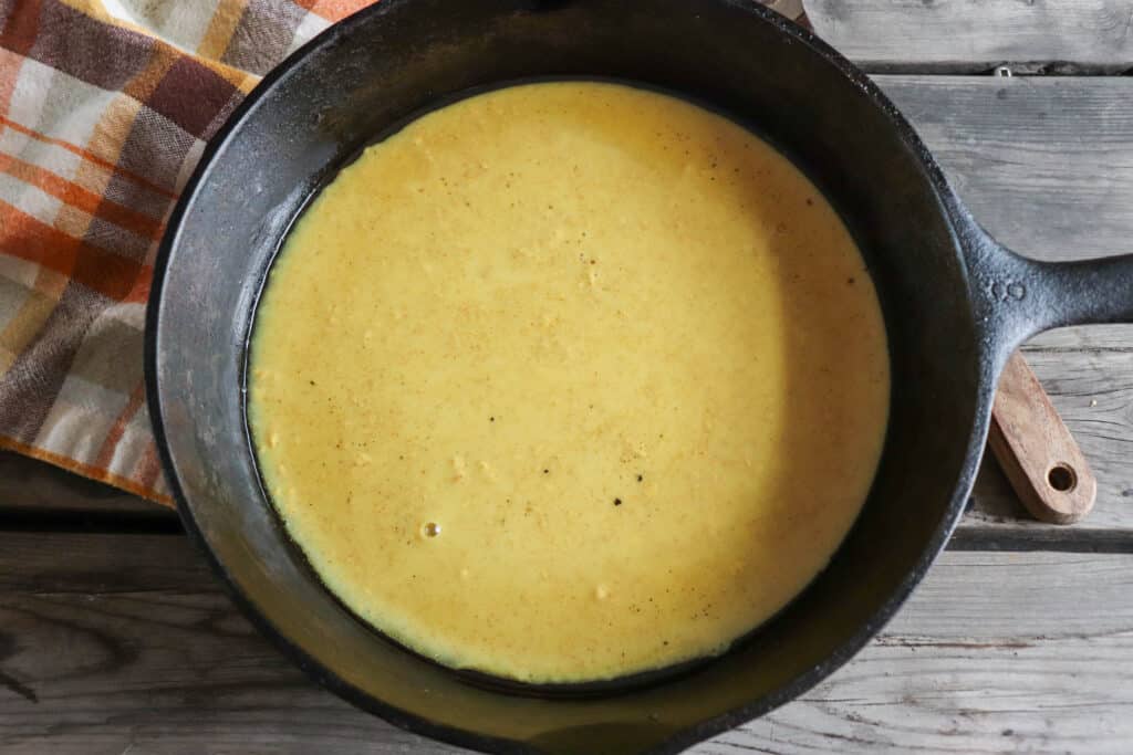 Honey mustard sauce in a cast iron skillet.