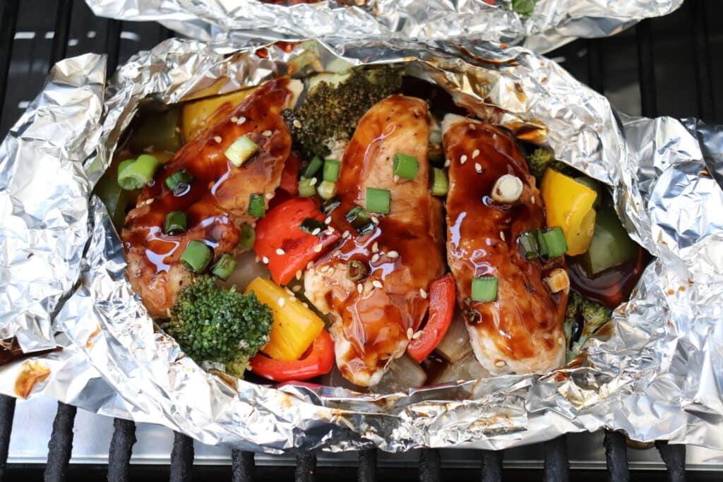 Teriyaki chicken in foil packets.