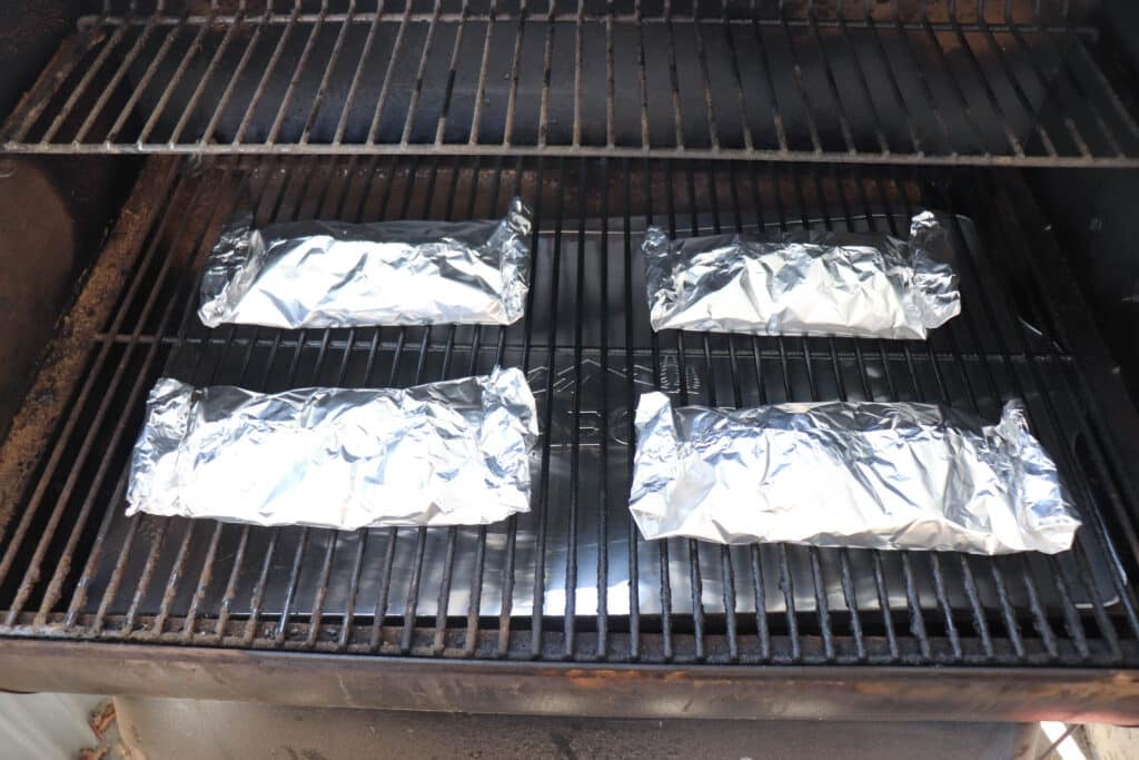 Foil packets on the grill.