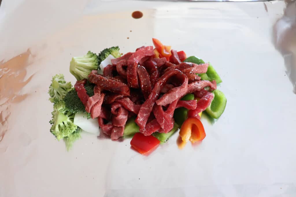 Teriyaki steak ingredients on foil.