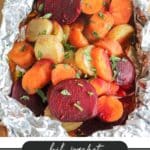 Foil packet filled with sliced carrots, beets, and potatoes, garnished with chopped herbs. The text Foil Packet Vegetables and the website campfirefoodie.com are displayed below the image.