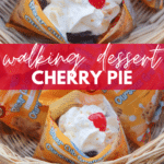 Bags of Bear Cub Crunch graham snacks filled with cherry pie filling, whipped cream, and a cherry on top are displayed in a wicker basket, labeled as “walking dessert cherry pie” by campfirefoodie.com.