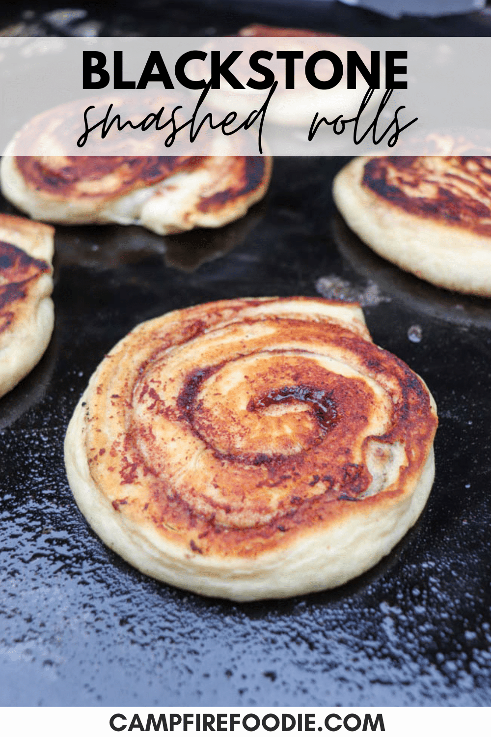 Close-up of golden-brown swirl rolls cooking on a Blackstone griddle. Text on the image reads: BLACKSTONE smashed rolls with campfirefoodie.com at the bottom.